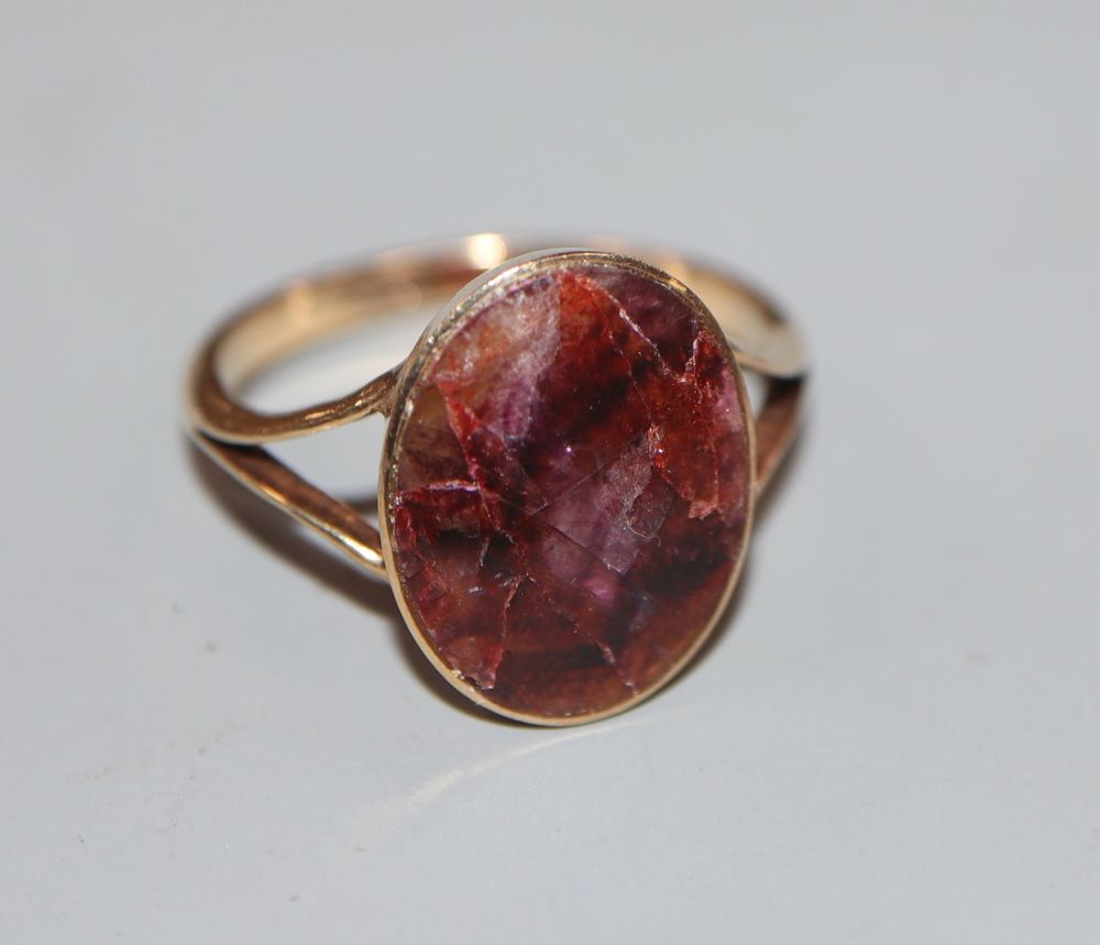 A 9ct and bluejohn set oval ring, size M, gross 2.7 grams.